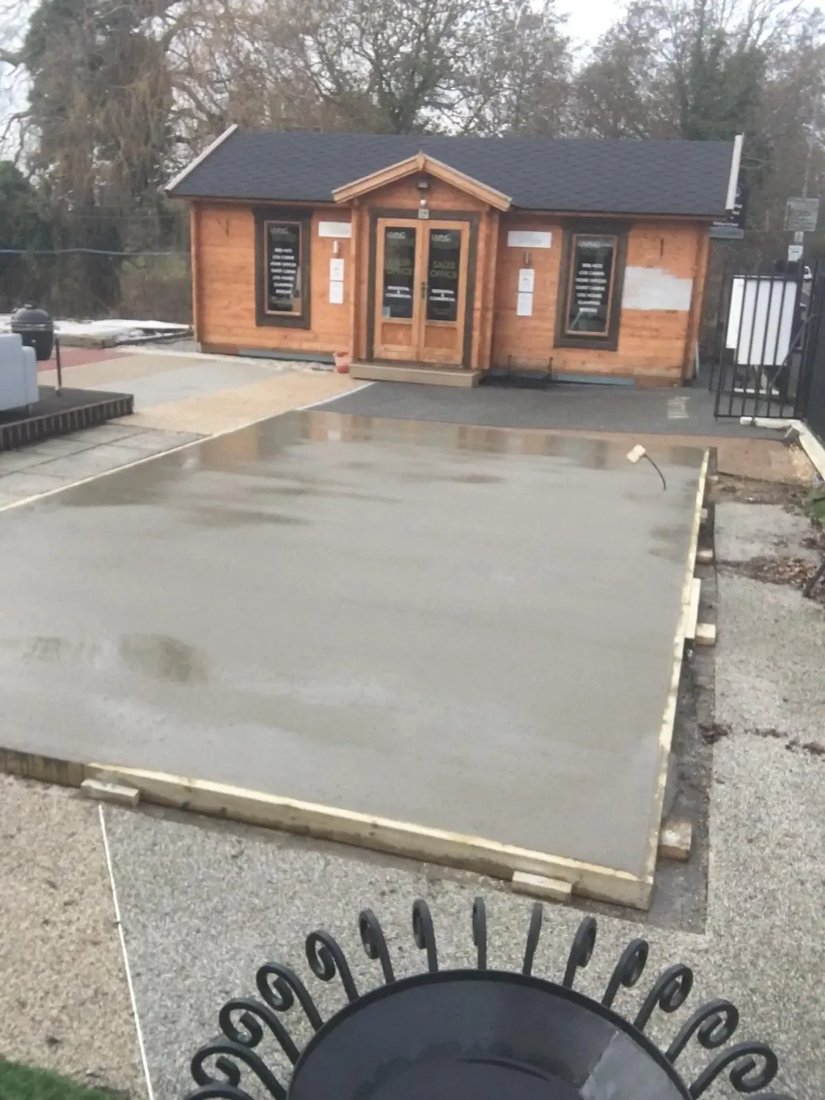 A level concrete base installed for a garden shed