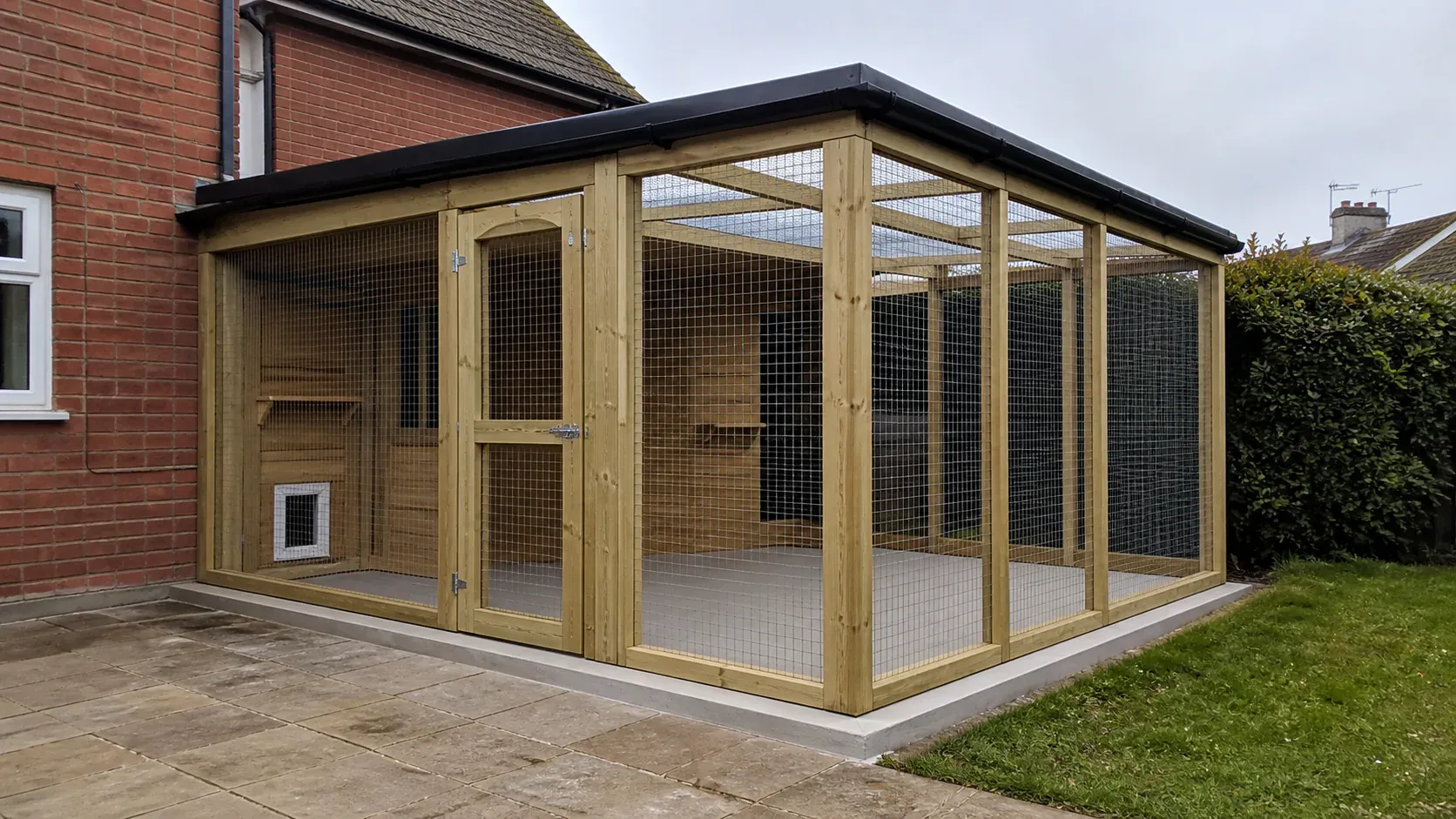 Secure outdoor cattery units on a clean level foundation