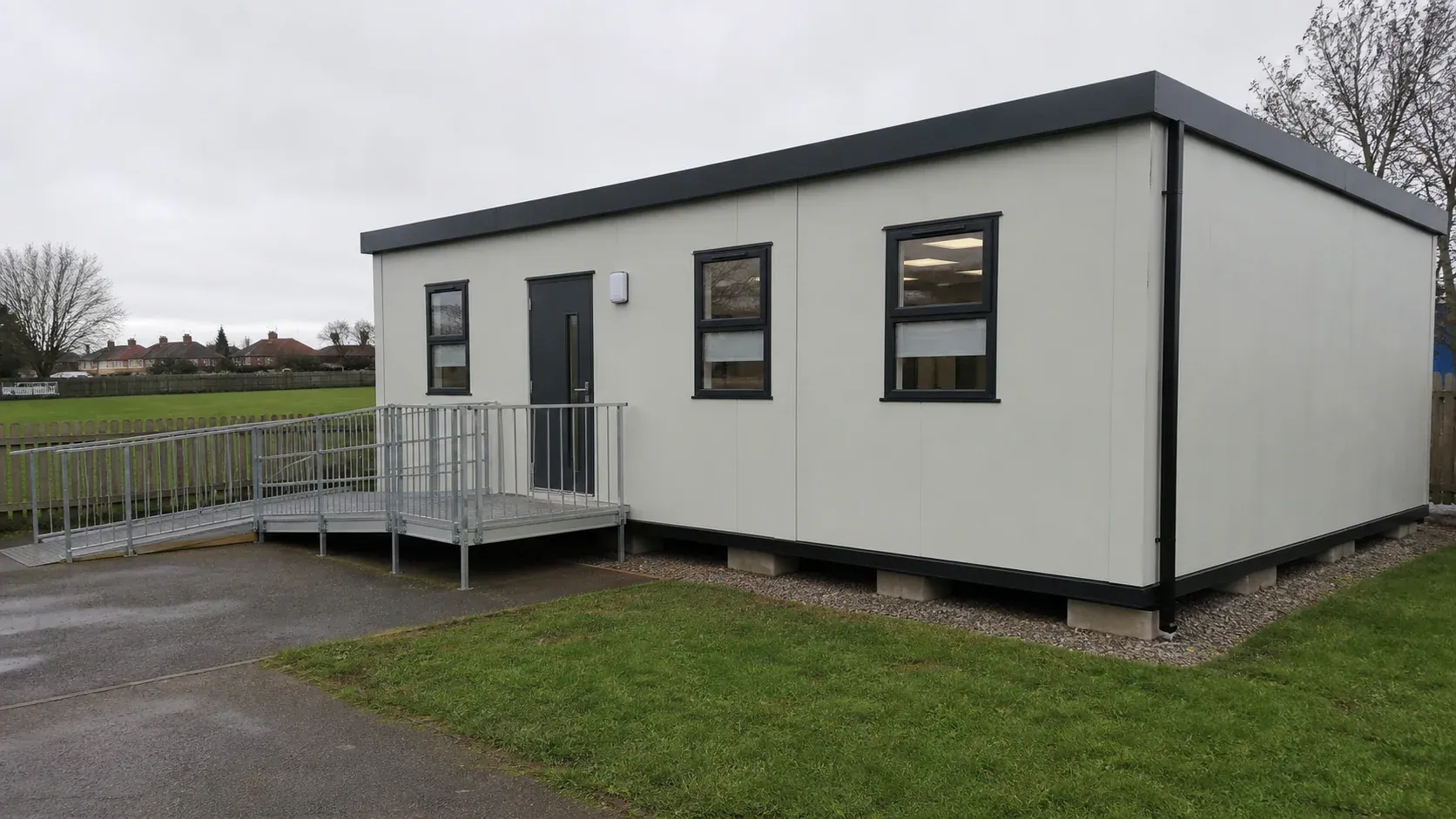 Single-storey modular classroom building on a prepared site