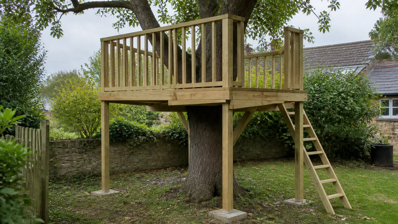 Timber treehouse with independent support posts among mature garden trees